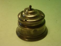 A Pewter Inkwell with domed lid and four quill apertures, lead weighted base. Early 19th century. 4