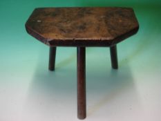 A Welsh Country Oak Stool. The line moulded shaped top with pollard burrs, raised on splayed