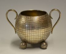Edwardian silver golfing sucrier c1905- In the form of a gutty golf ball, with two scrolled handles,