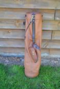 Fine and new large light tanned leather golf bag - made in England - circular shaped with 3