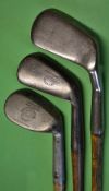 3x interesting irons to incl a large deep faced Smith's patent anti shank mashie fitted with a
