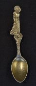 Gibson Girl - an American Sterling silver golfing teaspoon - the handle finely cast as one of the