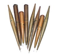 FLOATS: Eight Zephyr rolled paper floats in two patterns, lengths 3