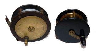 REELS: (2) An early ebonite and brass crank wind winch, the backplate stamped Patent, 3.5