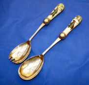 PORCELAIN: Pair of Royal Doulton porcelain handled salad servers, each 10