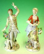 A Pair of Sitzendorf Figures Of a shepherd and companion shepherdess, brightly painted in a