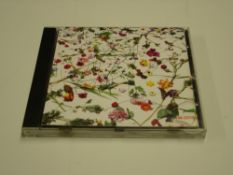 Prince Memorabilia A signed Purple Rain CD with Prince's full signature in blue biro. Prov: Obtained