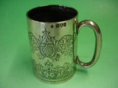 A Silver Mug Foliate engraved and inscribed 