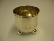 A George 111 Silver Bowl With repousse leaf decoration, moulded rim and raised on three ball feet.