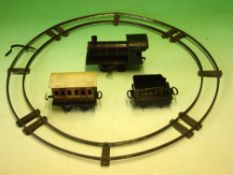 Gebruder Bing A tinplate 0 gauge clockwork train set comprising tank engine 2663, tender, coach