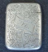 A Silver Vesta Case Engraved with foliage and a cartouche with initials ARB. 2
