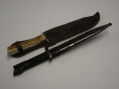 A Bayonet with Scabbard Numbered on the scabbard 14088, together with a bowie knife. Condition