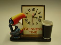 Advertising A Guinness mantel clock in typical form of a toucan and Guinness pint. 8 ½