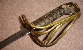 A Victorian Sword With scabbard. Length of blade 32