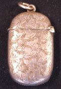 A Silver Vesta Case Of oval form and engraved with leaves, a vacant cartouche to one side. 1 5/8
