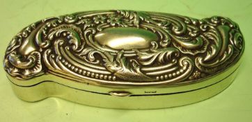 A Silver Snuffbox Of shaped form, the lid embossed with scrolling foliage around a vacant cartouche.