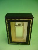 A Dunhill Unique Lighter No. 430339. Boxed with instruction manual. Condition report: Fine