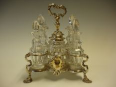 A George 111 Silver Plated Cruet Stand With four bottles and two jars, the latter with silver