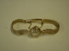 A Tudor Royal Lady's Wristwatch The case and Rolex bracelet in 9ct gold, the crown with Rolex