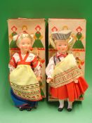 A Pair of Russian Dolls Plastic bodies and heads, c1960s, boxed. 11