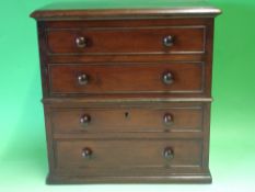A Victorian Miniature Mahogany Chest With four long cockbeaded drawers. 15