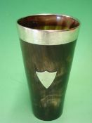 An Edwardian Horn Beaker With silver mounted rim and applied vacant shield cartouche. 5 ¾