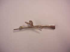 A Silver Gun and Pheasant Bar Brooch Marked Purdey verso. 2 ½