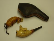 A Meerschaum Cheroot Carved as a catfish surmounted by a female figure, 3 ½