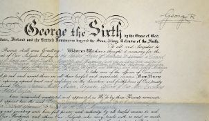 King George VI 1895-1952 signed document in ornate print and partially completed by hand in ink,