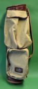 A leather and canvas oval golf club bag - complete with large golf ball storage pocket, travel