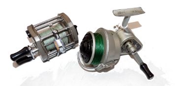 REELS: (2) JW Young Gildex alloy multiplier reel, hinged folding foot, twin black handles, level