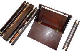 FLOAT WINDERS: (3) Early mahogany book style float/cast winder, 7