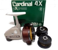 REEL: Abu Sweden Cardinal 4X spinning reel in as new condition, foot stamp 801100, brown-cream