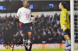 Jermaine Defoe signed colour photograph in Tottenham Hotspur colours, overall size 35.5 x 45.5cm,
