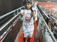 Aaron Lennon signed colour photograph in Tottenham Hotspur colours, overall 56 x 45cm, mfg.