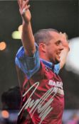 Julian Dicks signed colour print in West Ham United colours, overall 35.5 x 45.5cm, mfg.