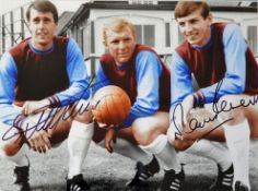Geoff Hurst and Martin Peters signed colour print in West Ham United colours, overall 47 x 57cm,