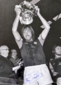 Billy Bonds signed black and white print in West Ham United colours, overall 45 x 56cm