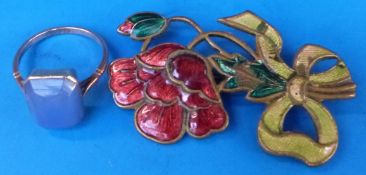 A 9ct gold ring set with a blue stone an