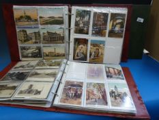 Three large albums of vintage postcards