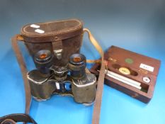 A cased set of Russian binoculars togeth