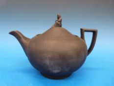 An 18thC Wedgwood black basalt teapot wi