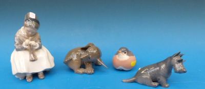 A Royal Copenhagen figure of a girl sewi