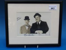 A hand signed framed Laurel and Hardy ph