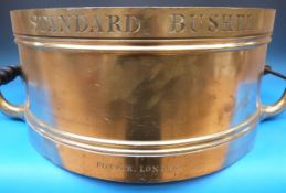 A large Victorian twin handed brass stan