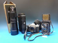 A Folk-Flex TLR camera together with a P