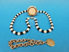 A pearl and jet beaded necklace, silver