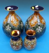 A pair of Royal Doulton stoneware vases