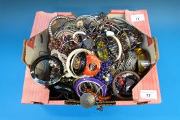 A large collection of bangles and bracel