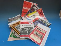 A quantity of vintage football programme